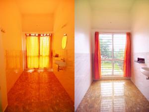 a bathroom with a sink and a window at Bluebell Holiday Inn in Yercaud
