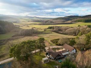 an aerial view of a house in a field at Nürburgring Eifelhaus in Baar