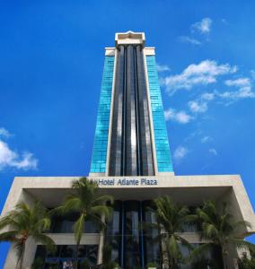 a tall building with a clock on top of it at Hotel Atlante Plaza in Recife