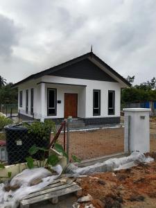 a house under construction with at IBY II Homestay in Ketereh