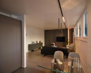 a living room with a couch and a table at Nuovo Fiore in Pesaro