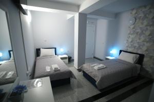 Postel nebo postele na pokoji v ubytování Hotel Korzo