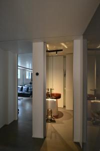 a living room with a couch and a table at Nuovo Fiore in Pesaro +29 photos