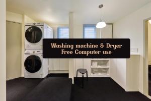 a laundry room with two washing machines and a chair at 메종드브릭 호텔 in Seoul +74 photos