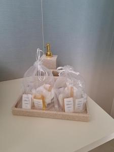a tray filled with packaged food on a table at Venti Magici Rooms in Peschici