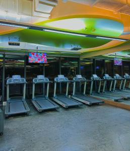 a row of empty seats in a gym at Knightsbridge Residences in Manila