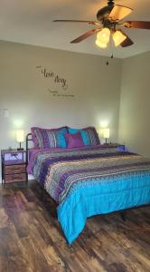 a bedroom with a bed with a sign that reads have sixty at Tiny Palace - 1-Bedroom Apartment - Multi-Week Stay - Pool - Washer-Dryer - Dog-friendly with fee for 1 Family Pet in Wilmington +21 photos