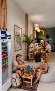 a group of people sitting in a living room at SEVEN Guesthouse in Thong Sala +12 photos