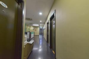 a hallway of a hospital with a hallway at SMC Hotel Seksyen 13 in Shah Alam