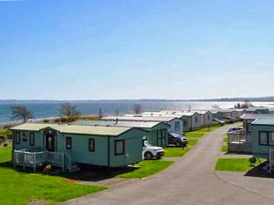 a row of mobile homes parked in a row at The View in Stranraer