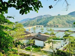 a view of a river and a bridge at KDL Pauon Ecolakes in Quỳnh Nhai