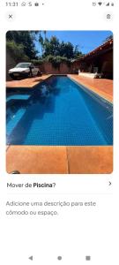 a picture of a swimming pool with the words never die piscina at Recanto da harmonia in Ribeirão Preto +4 photos