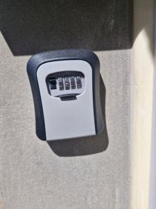 an electronic device is attached to a wall at DiS Apartman in Vršac