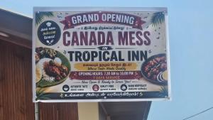 a sign for a canada mess in tropical inn at Tropical Inn Hotel in Kankesanturai