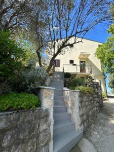 a stairway leading up to a house at Midpoint Sea and Sun in Kotor