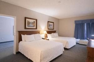 a hotel room with two beds and a window at Branson Towers Hotel in Branson +46 photos
