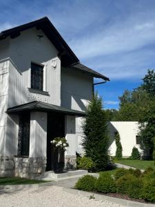 a white house with a black and white at Villa Pomona in Bled +53 photos