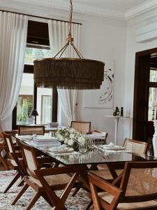 a dining room with a table and chairs at Villa Pomona in Bled