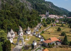 an aerial view of a village in the mountains at Abrigo da Serra - Soajo Mountain Lodge in Adrão