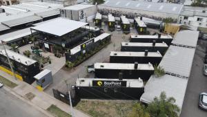 an aerial view of a parking lot with buildings at BoxPoint MotoResort in Córdoba