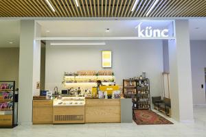 a karma store with a counter in a store at Baku Sabah Apart in Baku