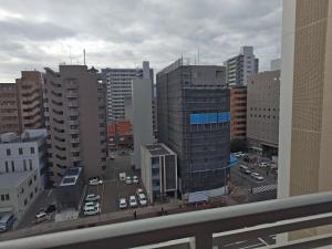 a view of a city with buildings and cars at StadtLeben東北ゲートウエイ2新築広々仙台駅徒歩5分 in Sendai