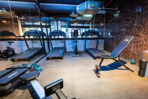an overhead view of a gym with several exercise bikes at فندق هوتيلتن HotelTen in Riyadh
