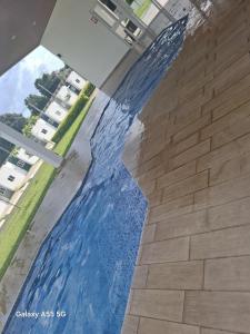 a pool of water in the floor of a building at Casa Cielo y Noche in Ahuachapán