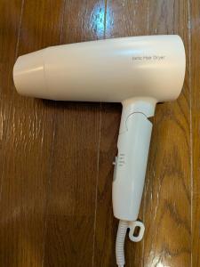 a hair dryer is attached to a wall at 大濠ウエストヴィレッジ409 in Fukuoka