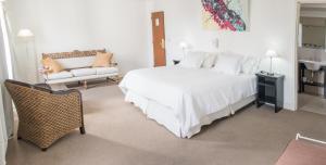 En eller flere senge i et værelse på Hotel Corbel Superior by bund + 33 billeder