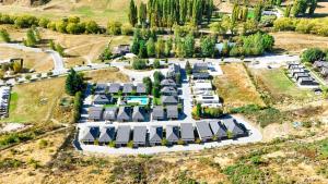 an aerial view of a villa in a park at Cardrona Ridge by Aotearoa Escapees in Cardrona +14 photos