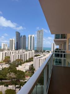 a view of a city from a balcony at 2b apartment by the Ocean in Sunny Isles Beach