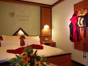 Letto o letti in una camera di Wanderhotel Grüner Baum