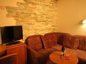 TV o dispositivi per l'intrattenimento presso Wanderhotel Grüner Baum