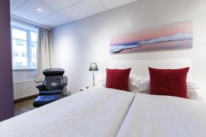 Postel nebo postele na pokoji v ubytování Centrum Hotel