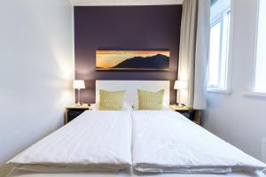 Postel nebo postele na pokoji v ubytování Centrum Hotel