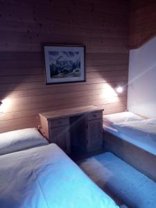 Un pat sau paturi într-o cameră la Digart