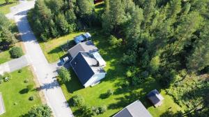 an aerial view of a house in a field at Villa Mio in Vidsel