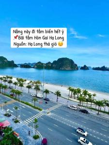 a picture of a road with a beach and water at Sao Mai Hotel Hạ Long in Ha Long