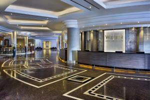 a lobby of a hotel with a waiting area at The Westin Grand Munich in Munich +128 photos