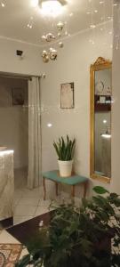 a potted plant sitting on a table in a room at Hotel IL Rifugio in Gonzaga +74 photos