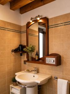 a bathroom with a sink and a mirror at Boutique Rooms 3 0 in Ferrara +59 photos