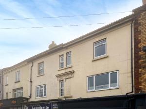 a building with many windows on the side of it at Primrose - Uk49360 in Bridlington