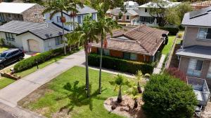 an aerial view of a house with palm trees at Mistral Breeze in Nelson Bay