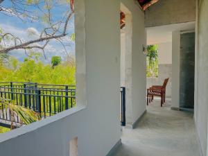 a view from the balcony of a house at Home in the Island in Tangalle