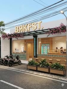 a restaurant with a motorcycle parked in front of it at Flex Living Canggu in Canggu