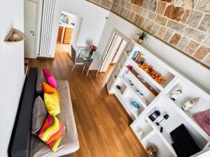 a living room with a couch and a table at Brezza Marina in Polignano a Mare