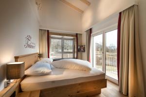 Posteľ alebo postele v izbe v ubytovaní Appartements Die Rifflerin