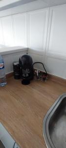 a toaster sitting on a kitchen counter next to a sink at Azurara Beach Nest in Azurara