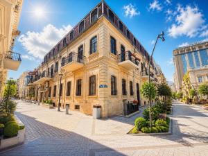 an old building on a street in a city at The Lantern Central Hotel in Baku